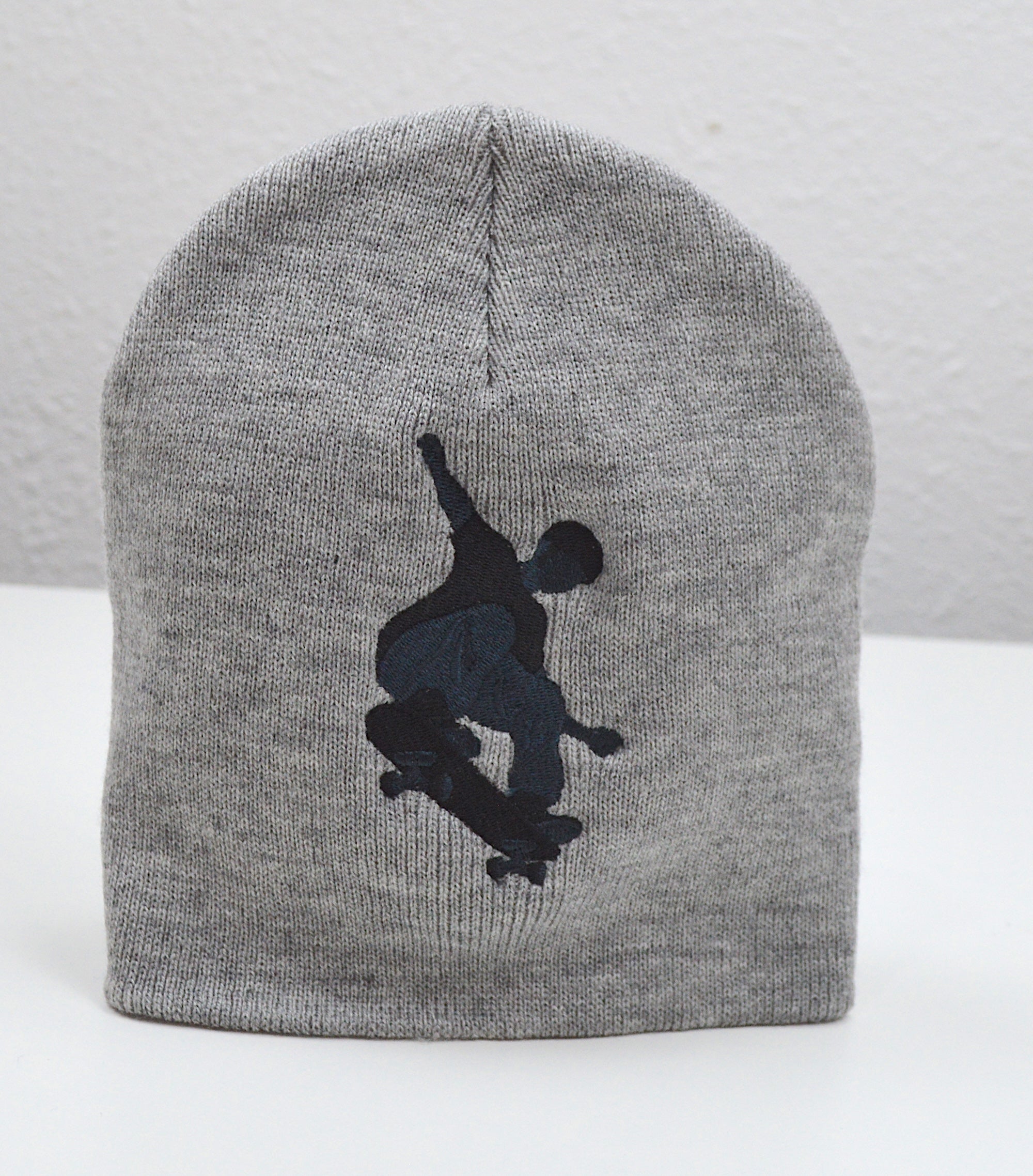 Skateboarder Embroidered Cuffless Beanie Hat