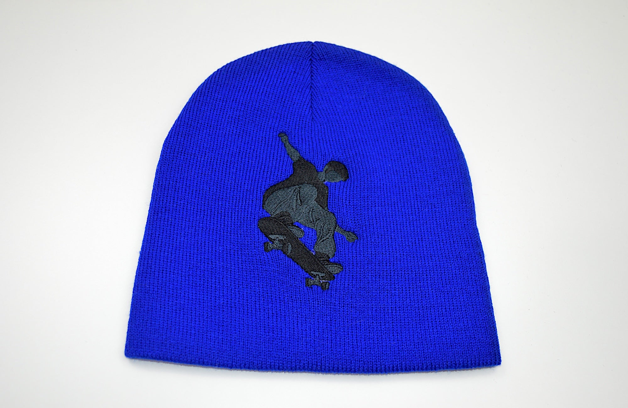 Skateboarder Embroidered Cuffless Beanie Hat