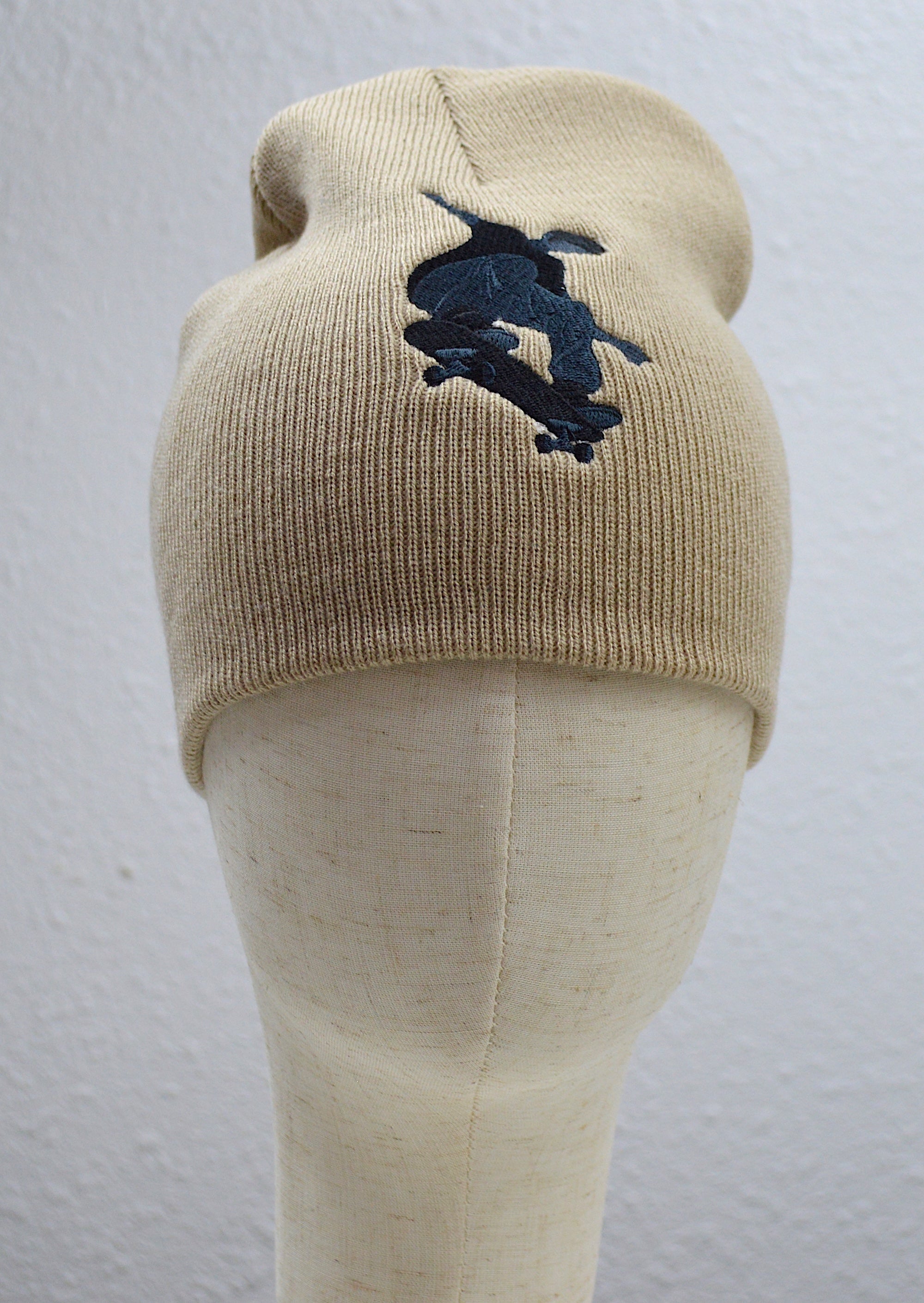 Skateboarder Embroidered Cuffless Beanie Hat